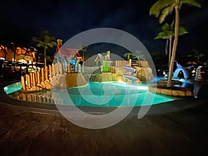 resort pool at night