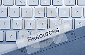 Resources - Inscription on Blue Keyboard Key photo