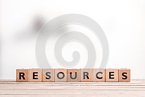 Resources sign on a wooden table