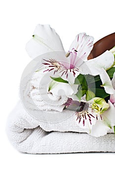 Resources for spa, white towel and flower