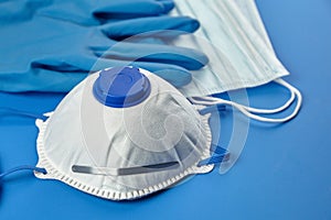 Respirator FFP2, disposable surgical face masks and rubber gloves, protection against coronovirus