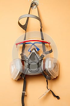 Respirator mask on the wall.
