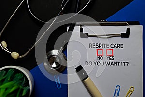 Respite Care, Do You Want it? Yes or No. On office desk background photo