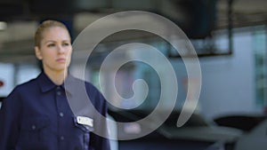 Responsible police woman leaving car, patrolling district, start of working day