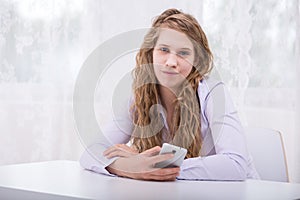 Responsible teenager with mobilephone