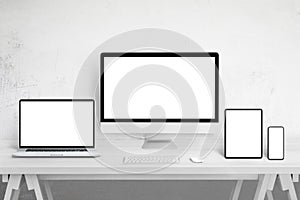 Responsive devices mockup for web site design promotion on different display sizes. Isolated white screens