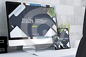 responsive devices showing responsive digital agency website on desktop