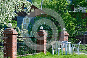 Rest place with apple tree in full blossom