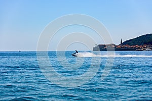 Rest on the sea. A man on a water motorcycle