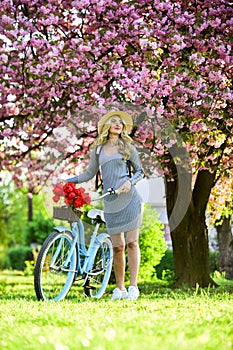 Rest and travel. United with nature. Athletic woman ride retro bicycle. Travel by bike. Weekend concept. Spring holidays