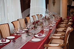 Restaraunt tables with red tablecloth