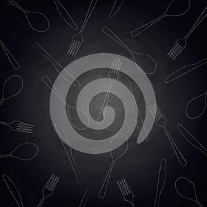 Restaurant background with fork, knife and spoon on chalkboard