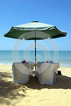 Restaurant on the beach with umbrella