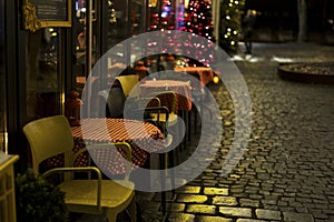 a restaurant or cafe. Tables and chairs in the outdoor restaurant. There are no visitors at the restaurant for dinner.