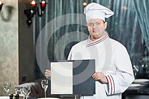 Restaurant chef cook with menu card