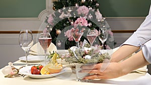 Restaurant concept. New Year and Merry Christmas feast table. Celebration table decoration.. Sliced fruit dish, cheese