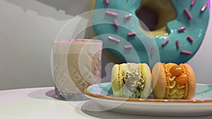 restaurant delicious beautiful serving macarons edible gold walnut two delicious delicacies on a plate coffee or latte