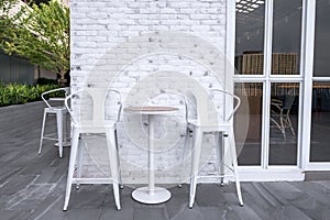 Restaurant dining table on terrace outdoor at evening time