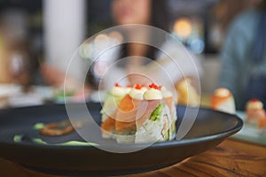 Restaurant, food and closeup of sushi on a plate for luxury, healthy and authentic Asian cuisine. Platter, fine dining