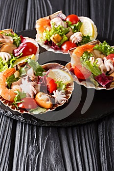 Restaurant gourmet seafood salad of shrimp, baby octopus, mussel