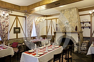 Restaurant interior with fireplace