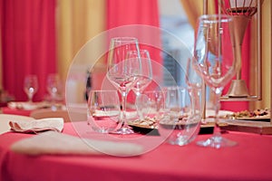 Restaurant interior -A table decorated with a red tablecloth in