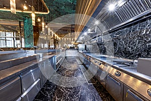 Restaurant kitchen interior with equipment.