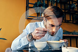 restaurant man soup and various dishes snack at work lunch break