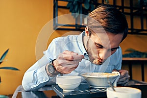 restaurant man soup and various dishes snack at work lunch break