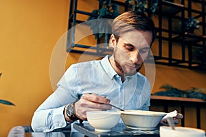 restaurant man soup and various dishes snack at work lunch break