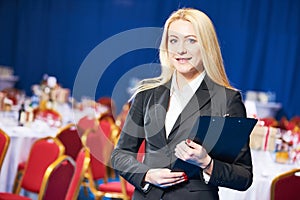 Restaurant manager or catering administrator at event
