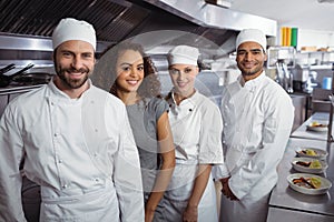 Restaurant manager with his kitchen staff