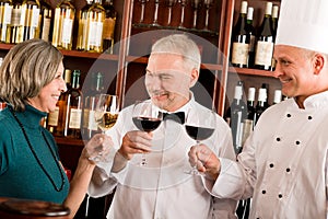 Restaurant manager posing with professional staff photo