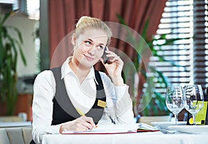 Restaurant manager woman at work