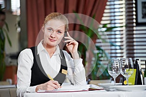 Restaurant manager woman at work