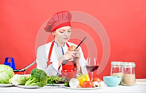Restaurant menu. Dieting. happy woman cooking healthy food by recipe. professional chef on red background. organic