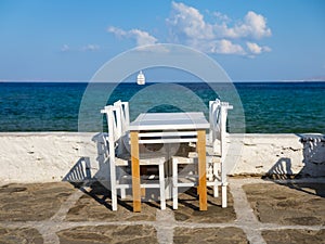 A restaurant overlooking Little Venice, Mykonos Island, Greece. Lunch and dinner overlooking the sea.