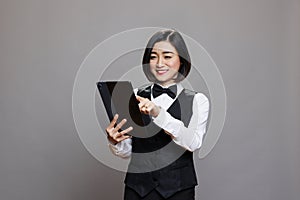 Restaurant receptionist with tablet
