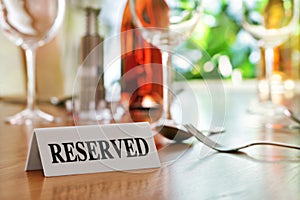 Restaurant reserved table sign photo