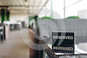 Restaurant reserved table sign with places setting