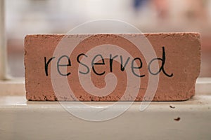 Restaurant reserved table sign. Restaurant reservation service.