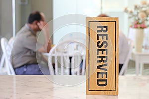 Restaurant reserved table sign on table