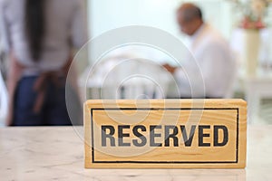 Restaurant reserved table sign on table