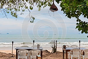 restaurant by the sea in the open air in the shade