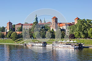 Restaurant ships in the river at the historic Wawel castle in Krakow