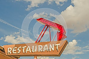 Restaurant Sign with Arrow