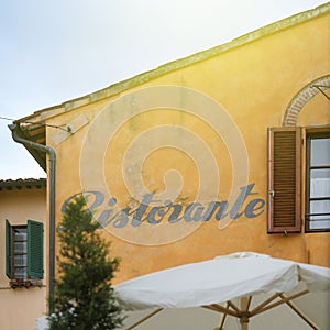 Restaurant sign Ristorante on a building caligraphic