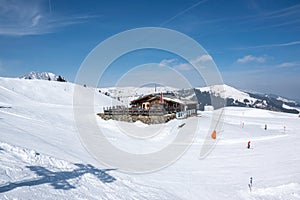 Restaurant on the slopes for skiers in winter in the Alps