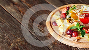 Restaurant snack menu cheese plate fruit nuts