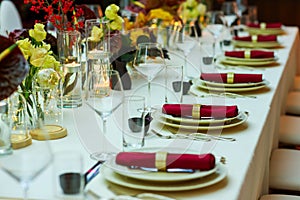 Restaurant table with napkins and wine glasses